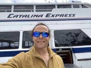 Blog author smiling outside the Catalina Express Ferry boat