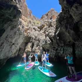 Stand up paddleboarding tour during yoga retreat Portugal