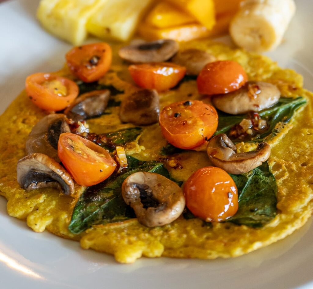 plant based retreat meal with chickpea omelette and vegetables